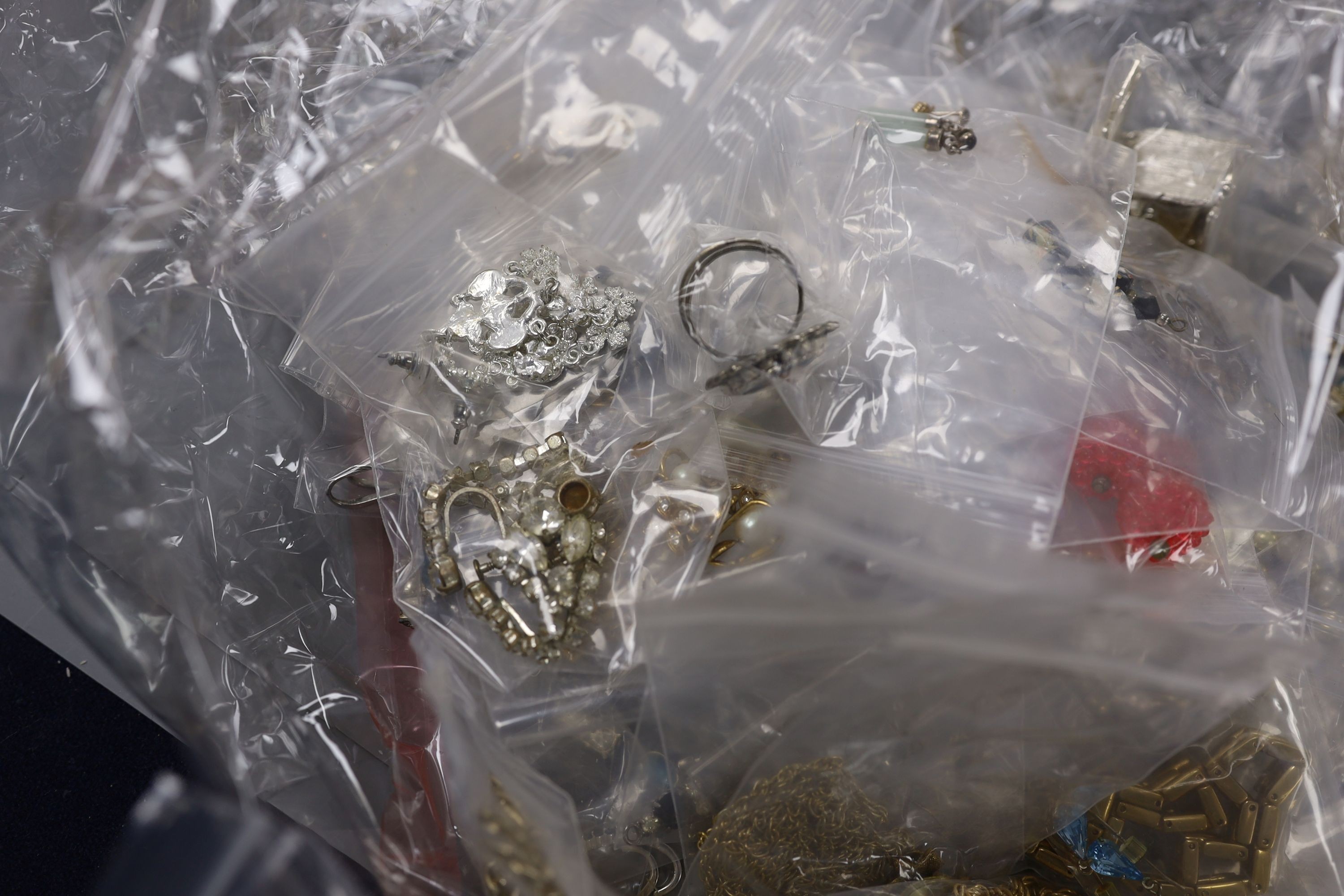 A silver charm bracelet, fitted numerous charms (some hallmarked) and a collection of silver and costume jewellery
